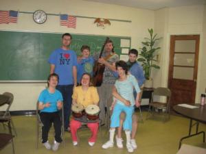 MUSIC THERAPYChildren playing musical instruments with music therapist John Foley